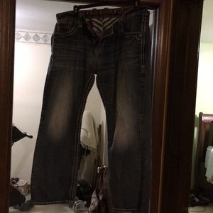 Rock revival men’s jeans blue in color